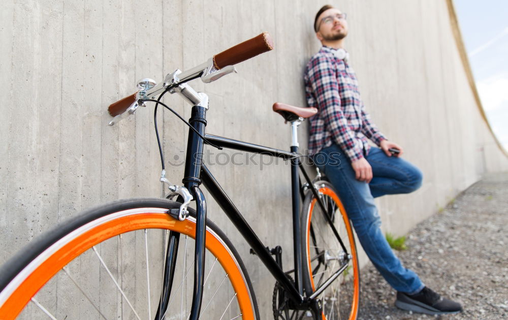 Similar – Handsome afro man relaxing near his bike.