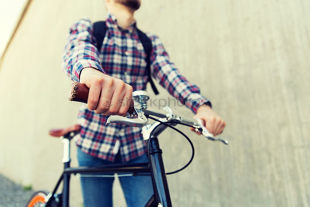 Similar – Young man on bike in the city