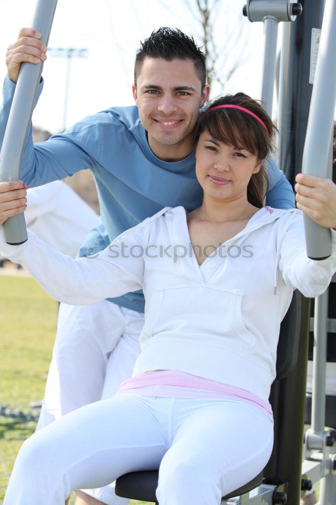 Similar – Couple in Fitness Attire Ready for Outdoor Workout