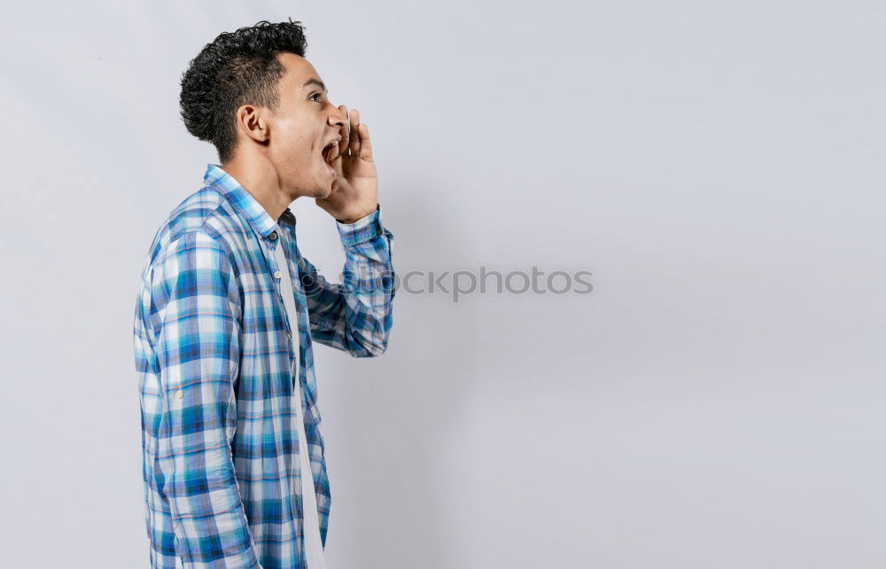 Similar – Boy making face with hands on seat