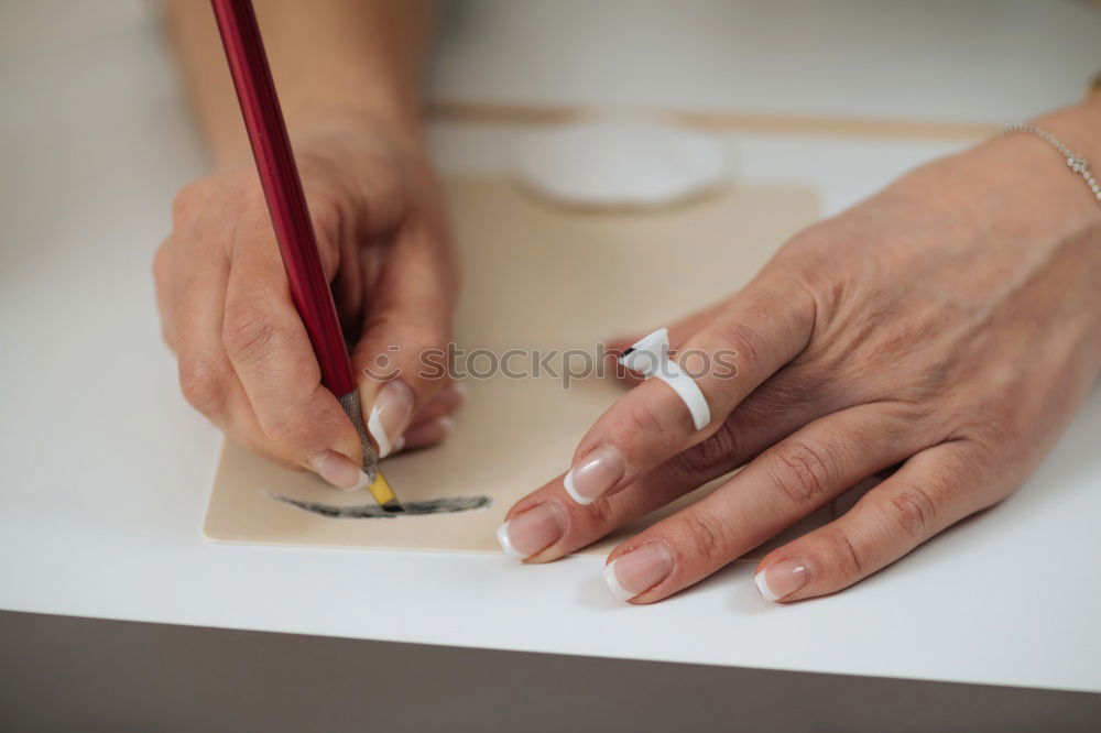 Similar – Close up on woman’s hands sewing needle and thread. Old woman working wasted hands .Tailor sewing some fabric. Details, low light, moody