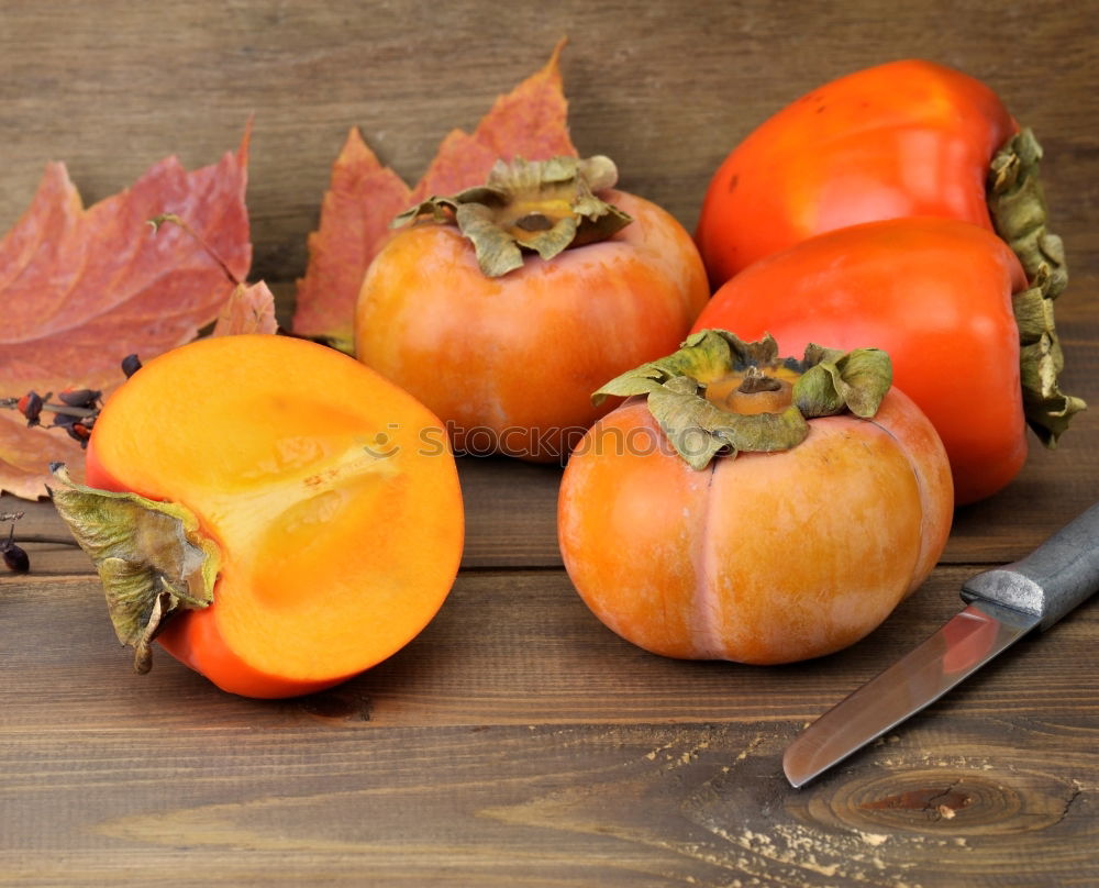 Image, Stock Photo Half pumpkin with seeds and cooking spoon