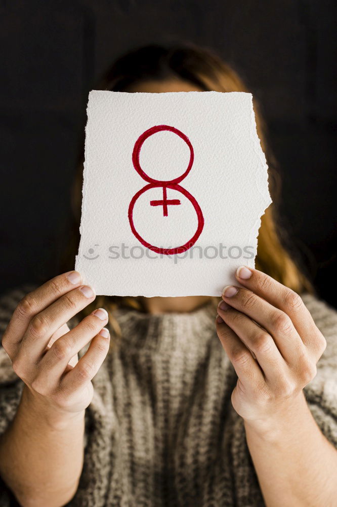 Image, Stock Photo Young woman with a feminine symbol painted in her hand