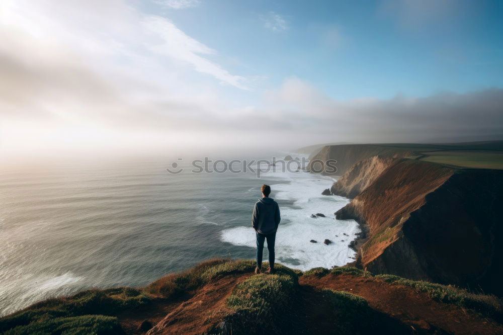 Similar – Woman standing on white cliffs by sea in England