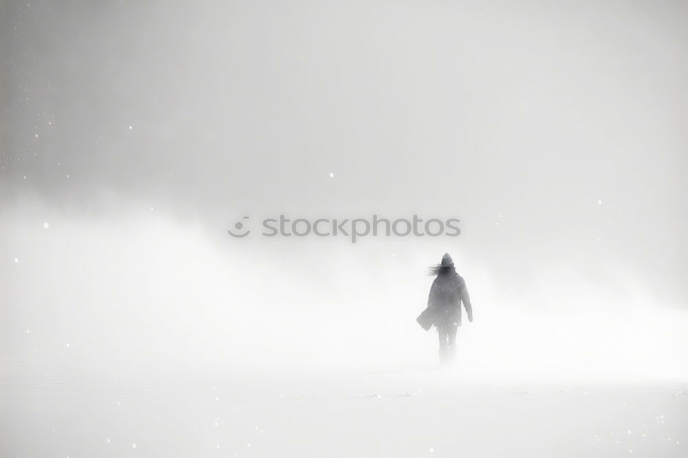 Similar – Woman wearing trench coat and standing in fog