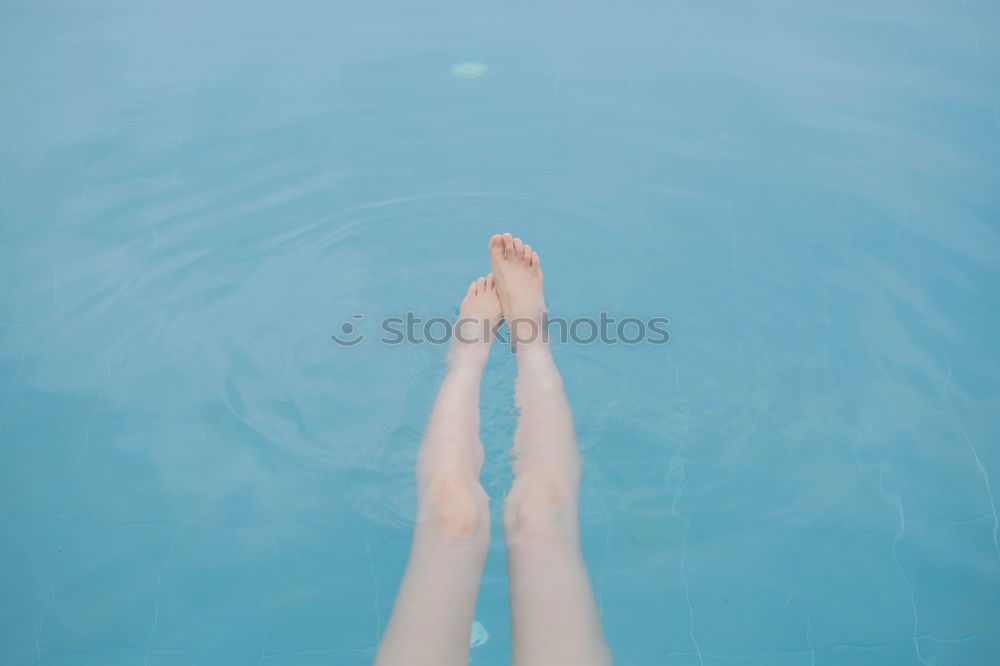 Similar – Image, Stock Photo Stairs of a pool with boy legs