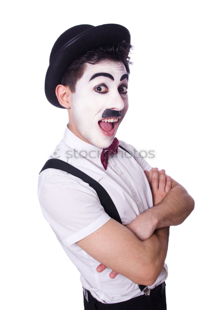 Young man wearing a clown costume