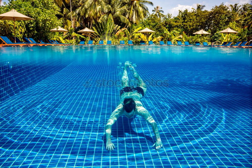 Similar – Woman in lagoon on tropical island