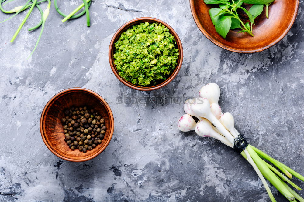 Similar – Green kale pesto in glass on dark rustic kitchen table background with ingredients, top view. Kale preparation. Healthy detox vegetables . Clean eating and dieting concept.