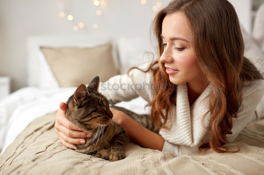 Similar – Image, Stock Photo Happy woman kissing her cat.