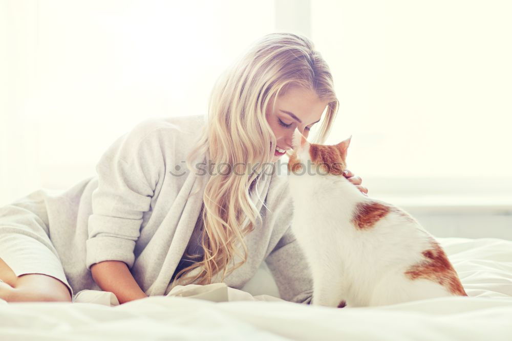 Image, Stock Photo Happy woman kissing her cat.