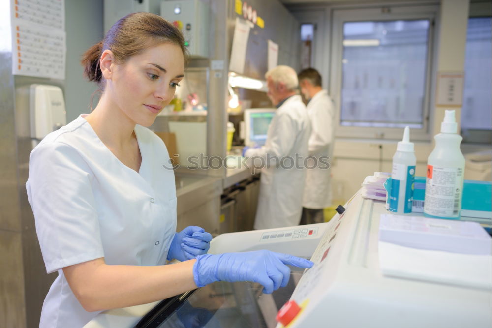 Similar – Image, Stock Photo Woman in whites standing in lab