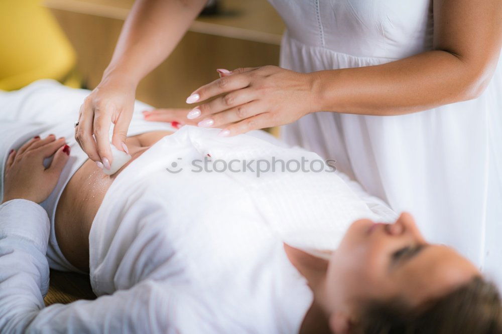 Similar – Image, Stock Photo Woman receiving massage on shoulders in clinical center