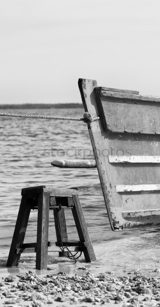 Similar – Obdachloser schläft am Strand eines Urlaubsortes