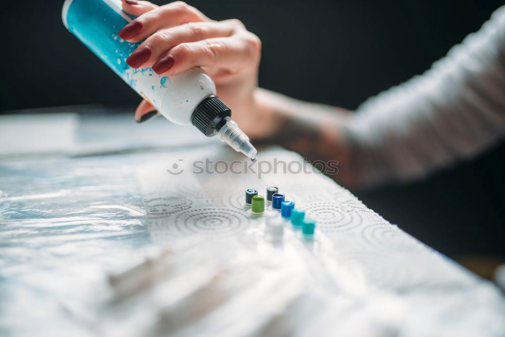 Similar – Close up on woman’s hands sewing needle and thread. Old woman working wasted hands .Tailor sewing some fabric. Details, low light, moody