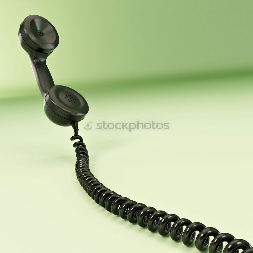 Similar – Part of an old red telephone with handset and ringed cord