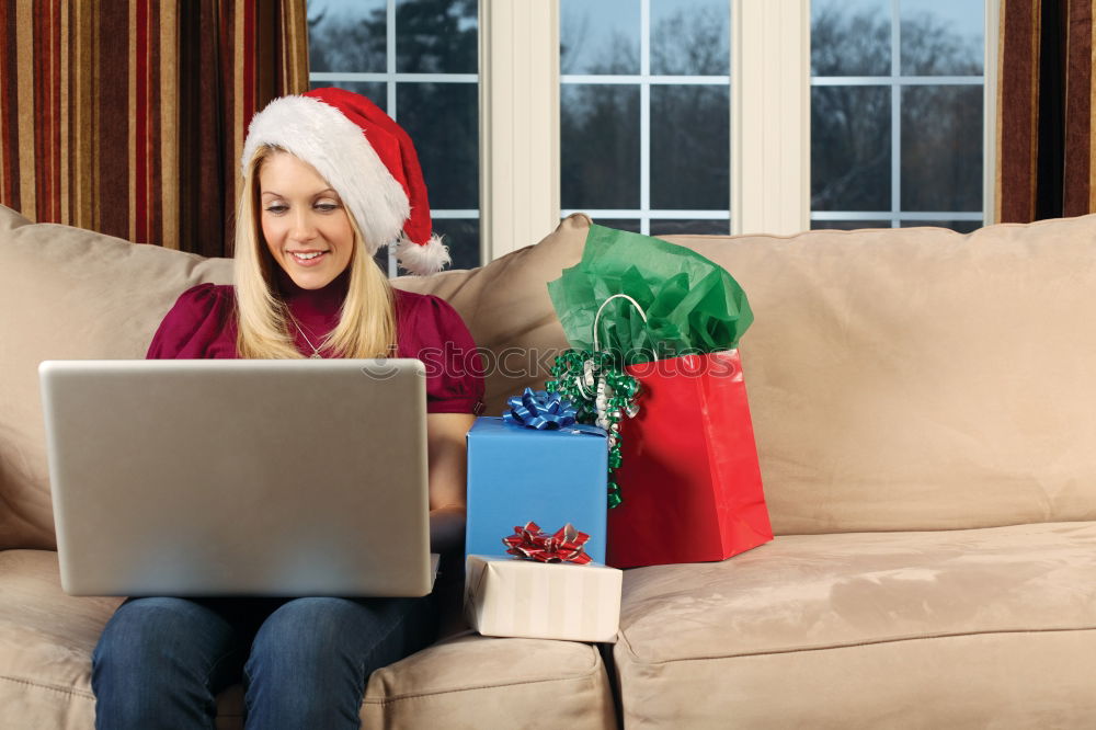 Similar – A happy couple with a child is celebrating Christmas with their friends on video call using webcam. Family greeting their relatives on Christmas eve online. New normal