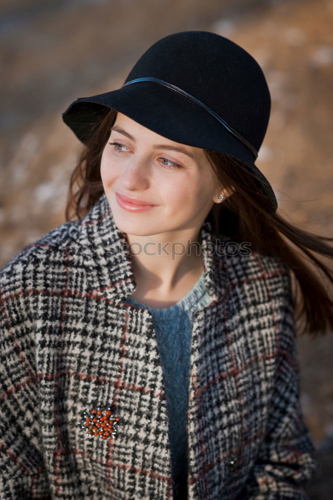 Similar – Beautiful redhead woman wearing winter clothes