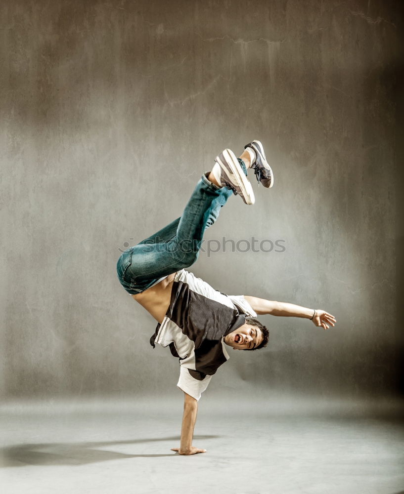 Similar – Young funny couple enjoying and doing a handstand