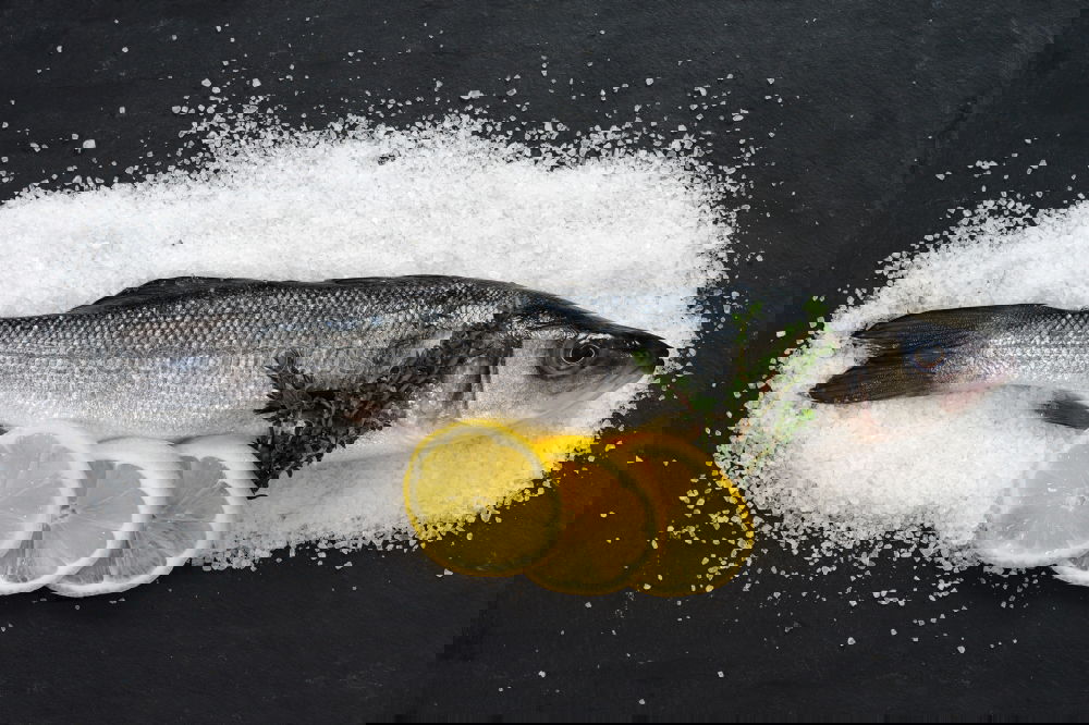 Image, Stock Photo Fresh smelt fish in spices for cooking on a kitchen board