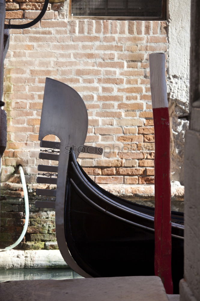 Similar – Shovel Broom Garden tools leaning against the wall