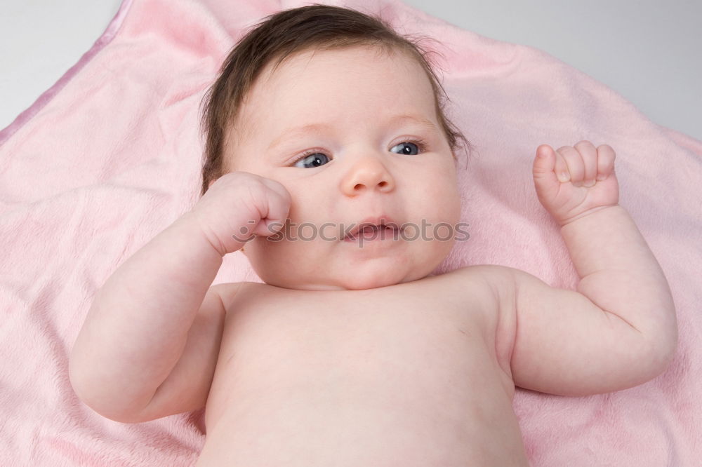 Similar – Little baby girl lying on blanket with colourful polka dots