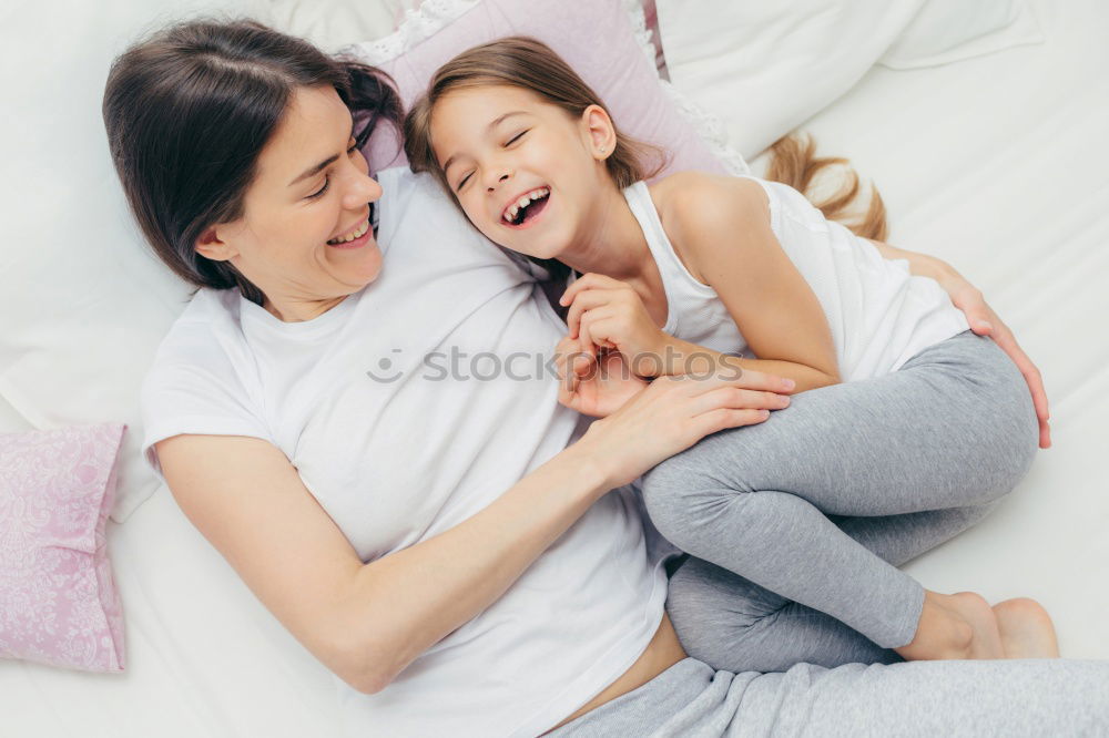 Similar – happy mother hugs her toddler son