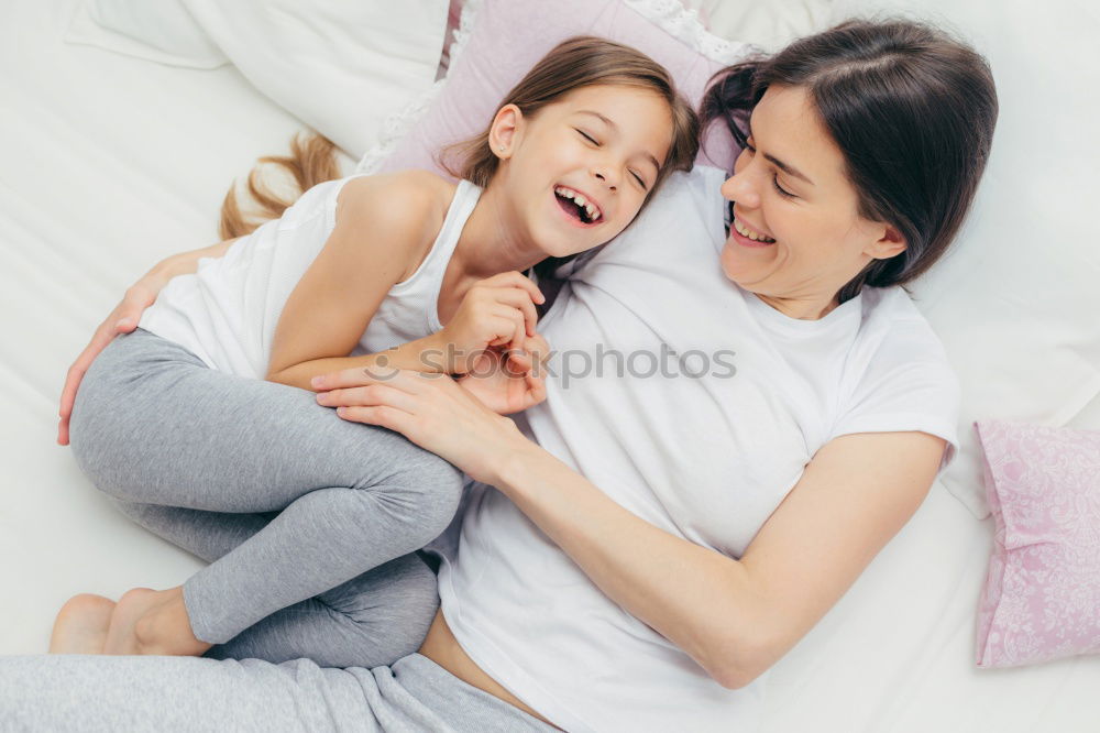 Similar – happy mother hugs her toddler son