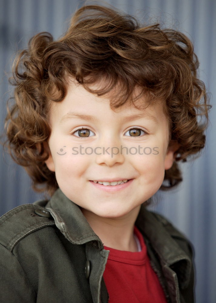 Similar – Small child with two years and curly hair looking at camera