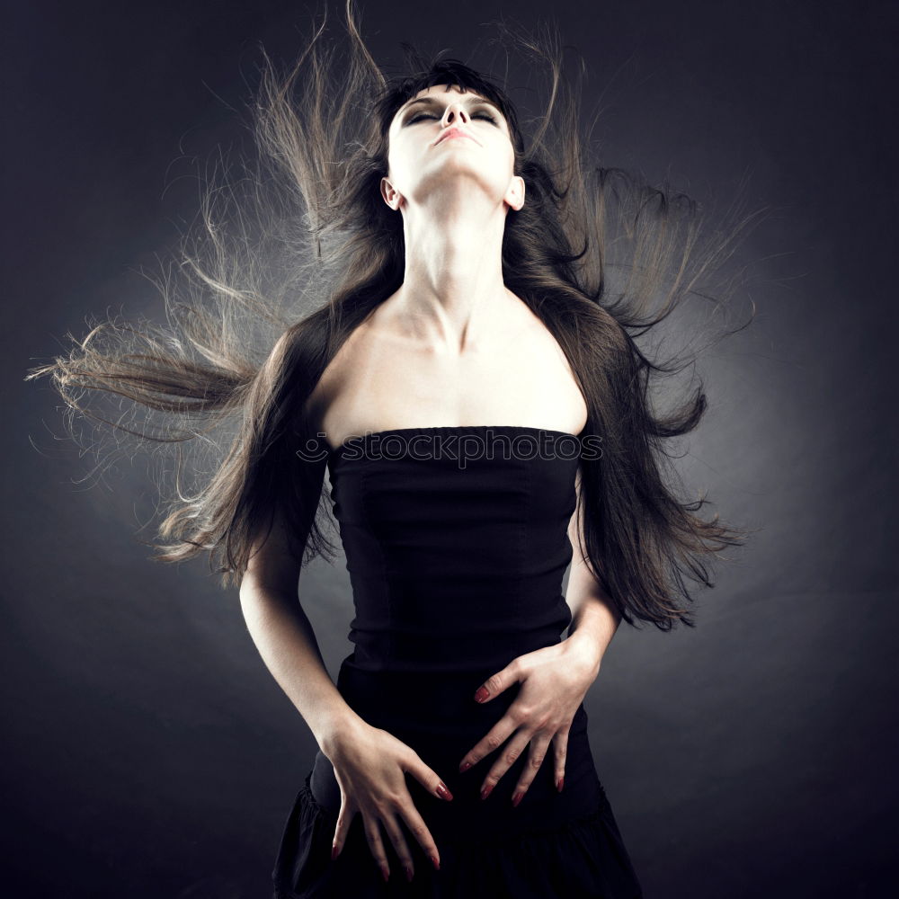 Similar – Image, Stock Photo young sexy woman lies between two black shadow stripes on the floor in the sun and casts a strong shadow