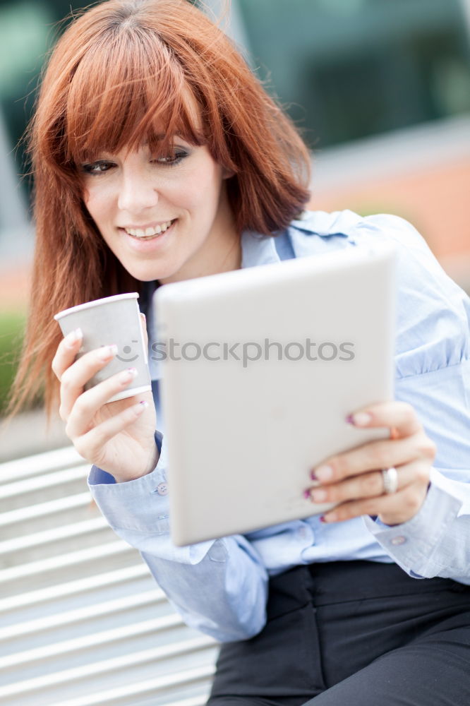 Similar – Image, Stock Photo Smiling African woman using digital tablet outdoors.