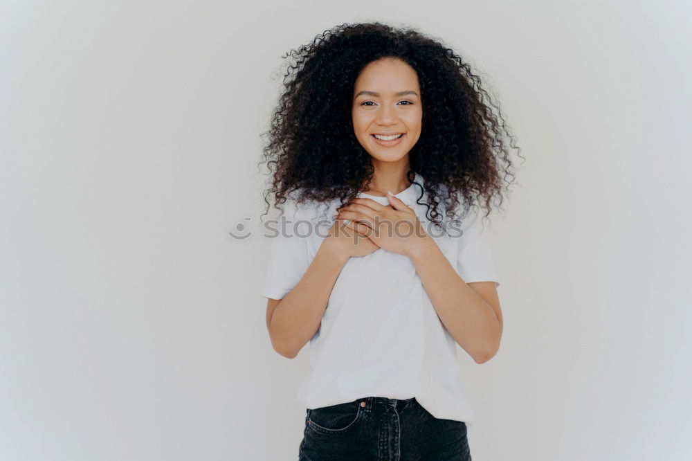 Young casual woman using her smartphone