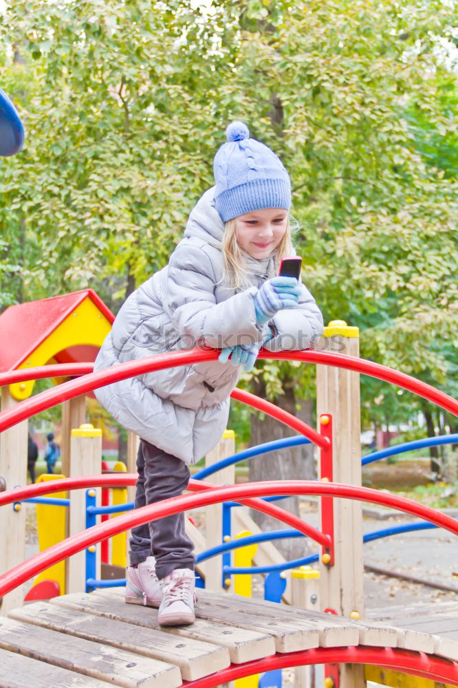 Similar – Child on a slide Joy