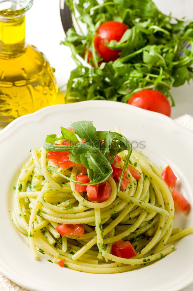 Similar – Bsilikum Pesto with spaghetti and tomatoes