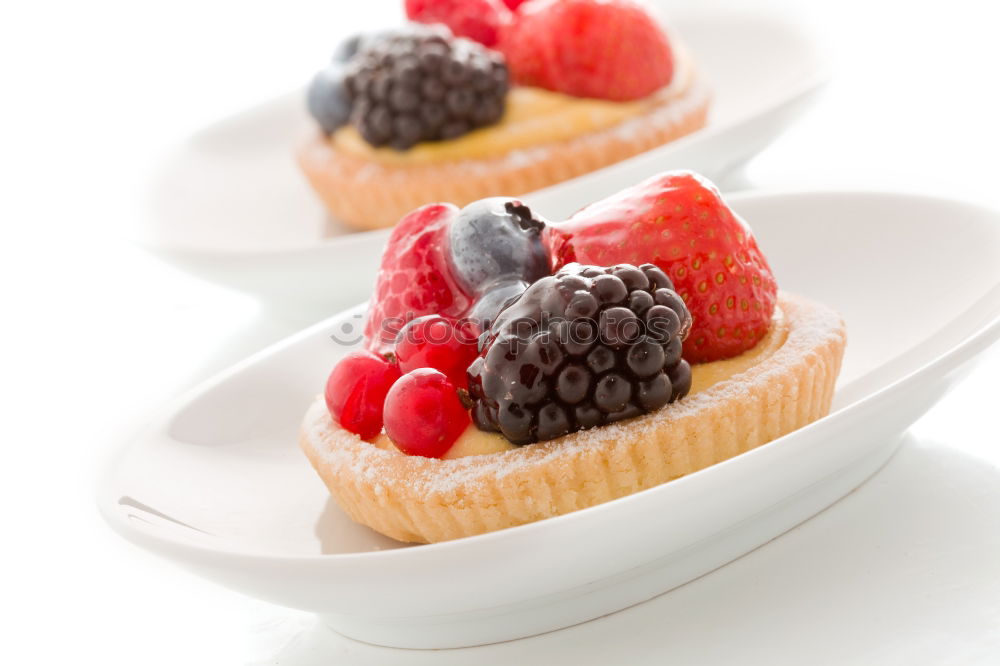 Similar – Image, Stock Photo Delicious tartlets with raspberries and blueberries