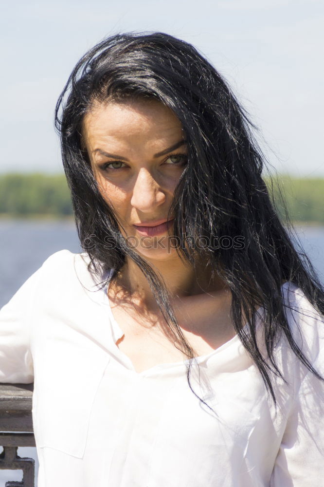 Image, Stock Photo Portrait of tall beautiful woman with long dark curly hair in nature
