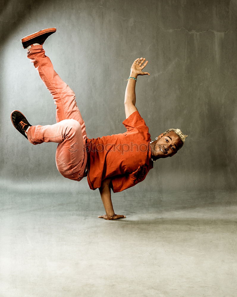 Similar – Image, Stock Photo Young black man wearing casual clothes jumping outdoors