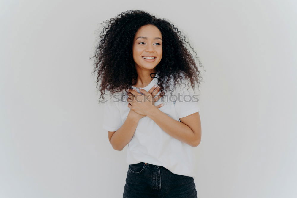 Similar – Young happy woman surrounded by green leaves