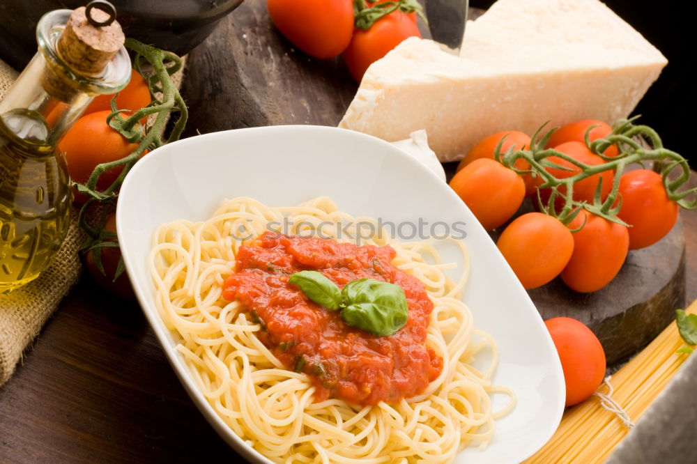 Similar – Image, Stock Photo Spaghetti pasta with tomato sauce, basil and cheese