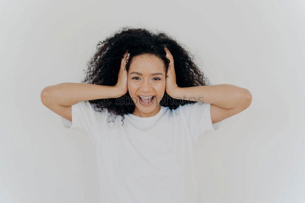 Similar – Ethnic woman making faces