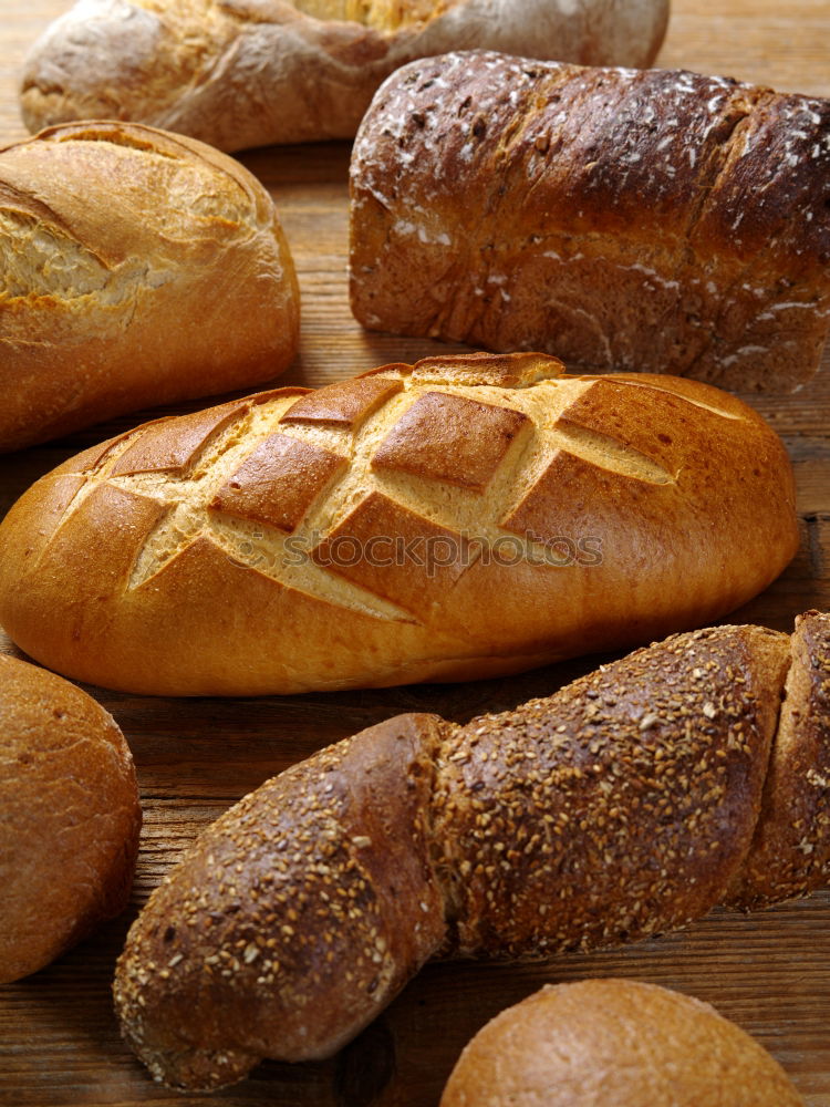 Similar – Many mixed breads and rolls.