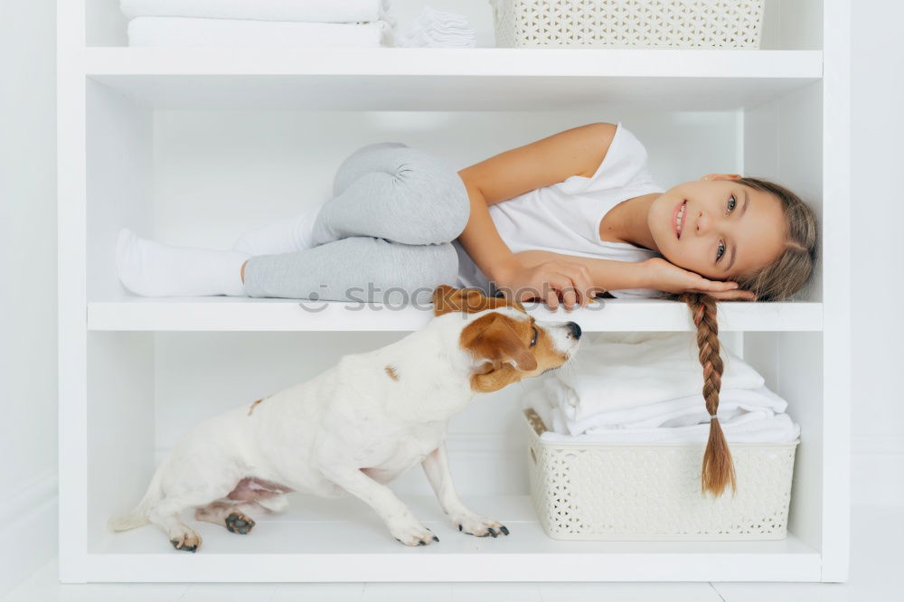 Similar – Image, Stock Photo African girl sits next to her teddy bear at home