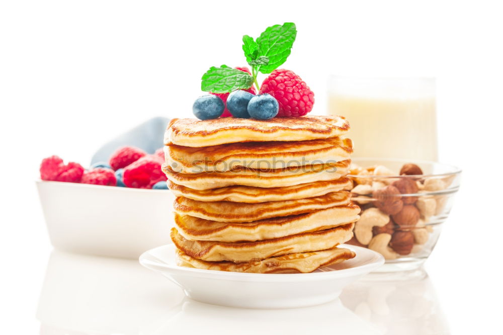 Similar – Image, Stock Photo Pancakes with raspberries and blueberries on white