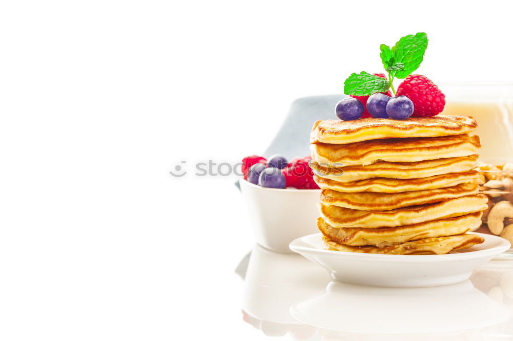 Similar – Image, Stock Photo Pancakes with raspberries and blueberries on white