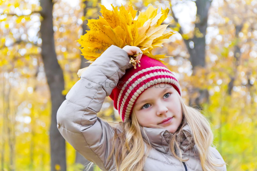 Similar – Image, Stock Photo Girl with bouquet from sheets in autumn