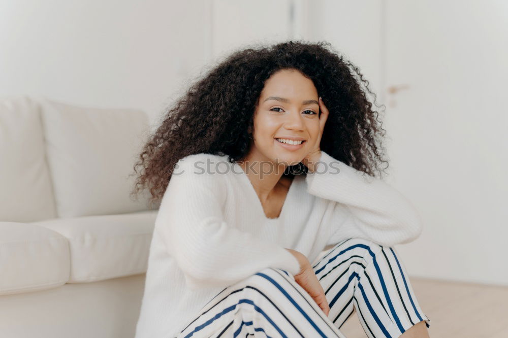 Similar – Happy beautiful young black woman relaxed sitting in the bed