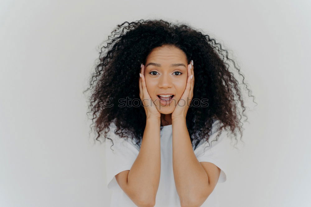 Similar – Image, Stock Photo Young mixed woman with afro hairstyle smiling