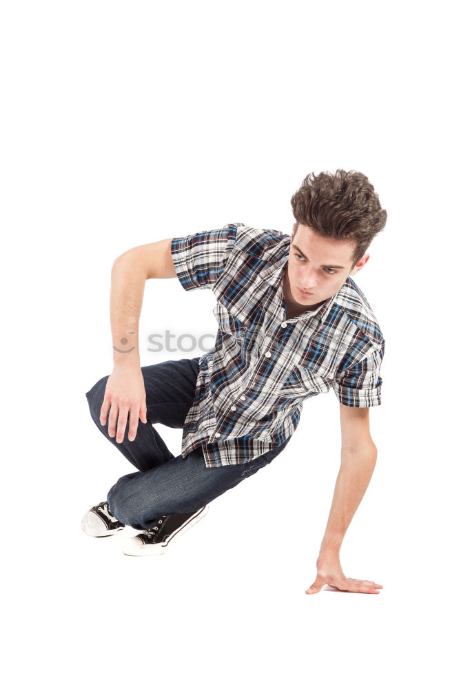 Similar – Young man sitting on the floor in urban background