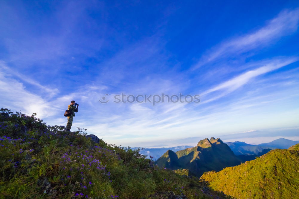 Similar – Hiker photographs the landscape