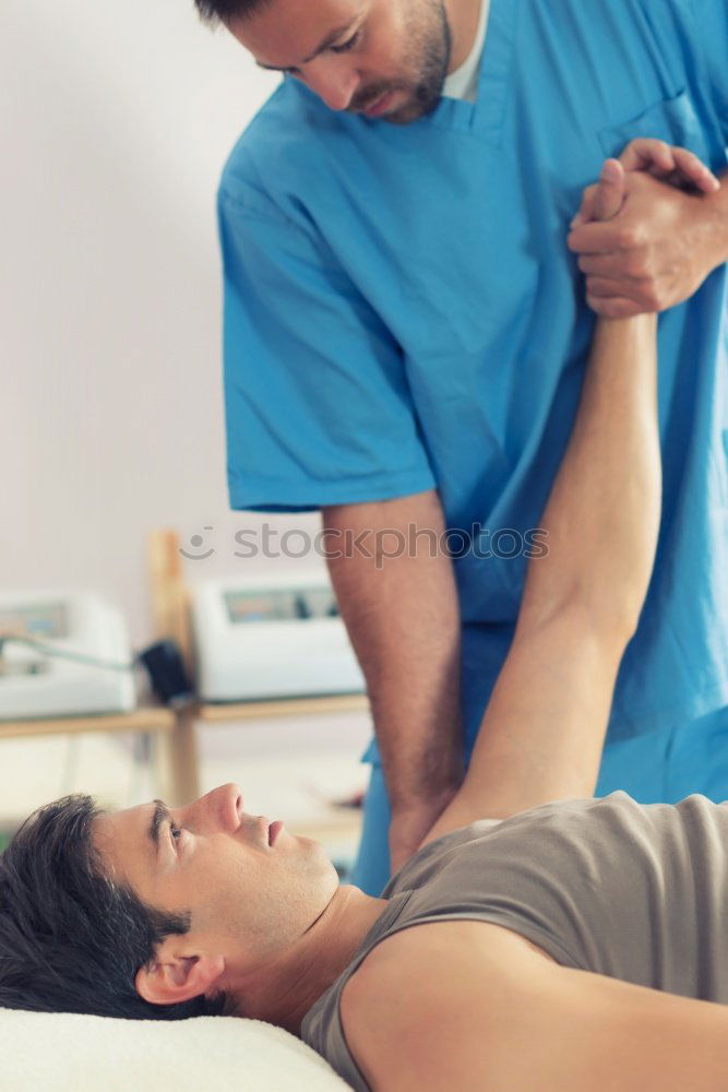 Similar – Image, Stock Photo young man at the physio therapy with pain